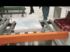 Come si aziona la macchina automatica per l'impilaggio di pannelli per controsoffitti in gesso?